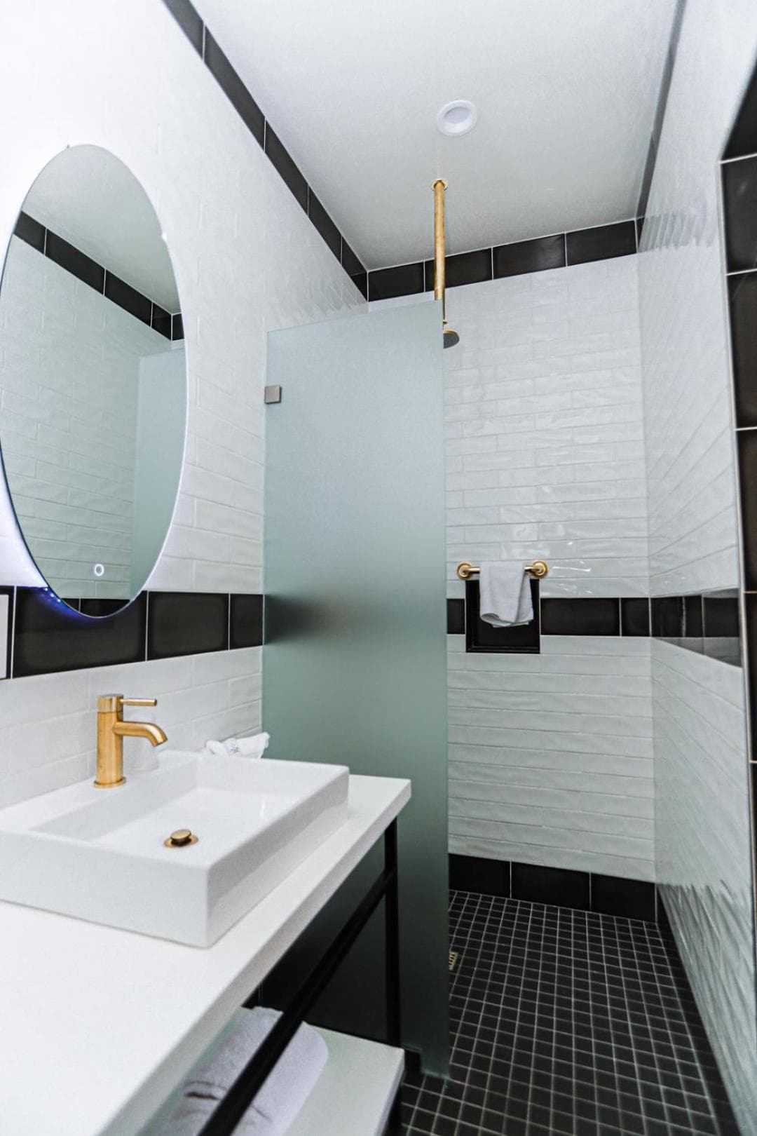 H by H Hospitality: bathroom