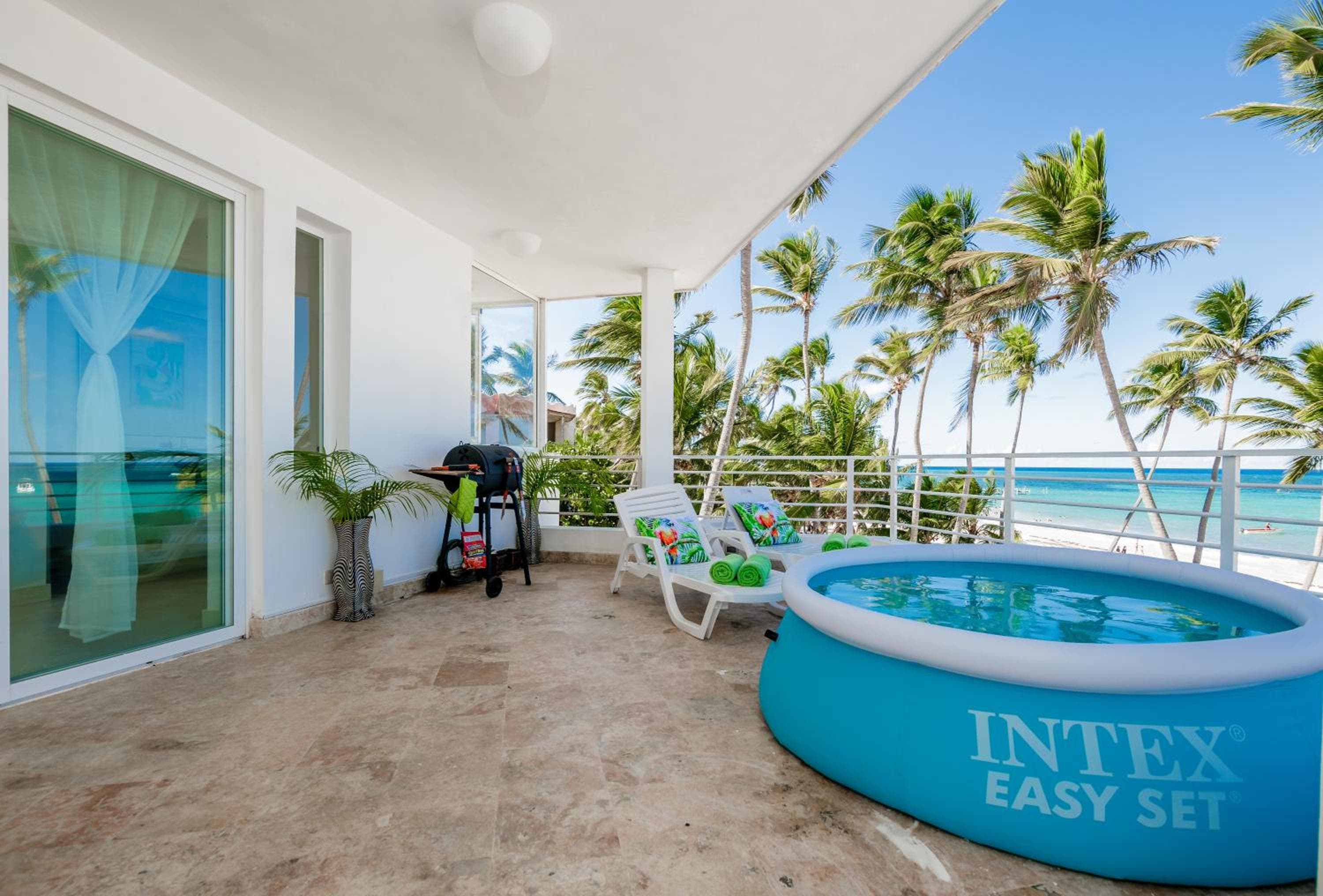 Beachfront Punta Cana Condo for Rent - Ocean View, Private Terrace, and BBQ